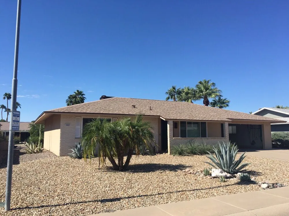 Slide of Singh Roofing