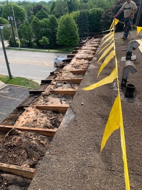 Slide of Singles Roofing & Construction