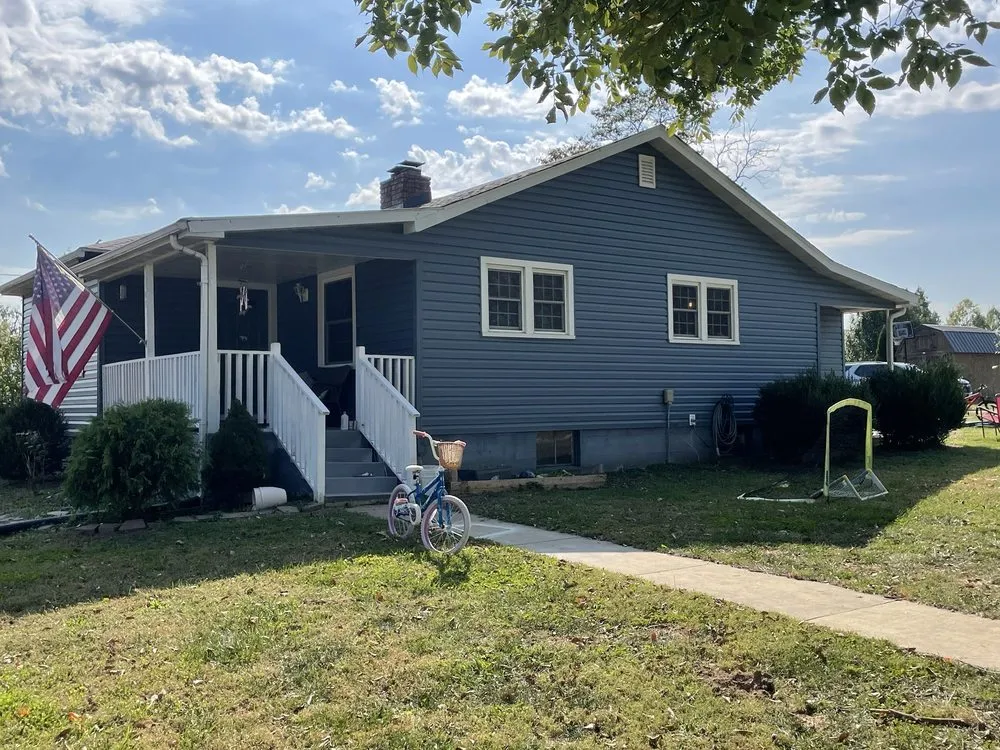 Slide of Sinnott’s Roofing & Remodeling