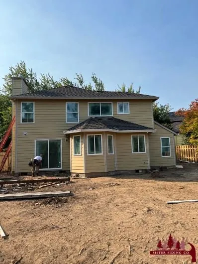 Slide of Sister Siding Company