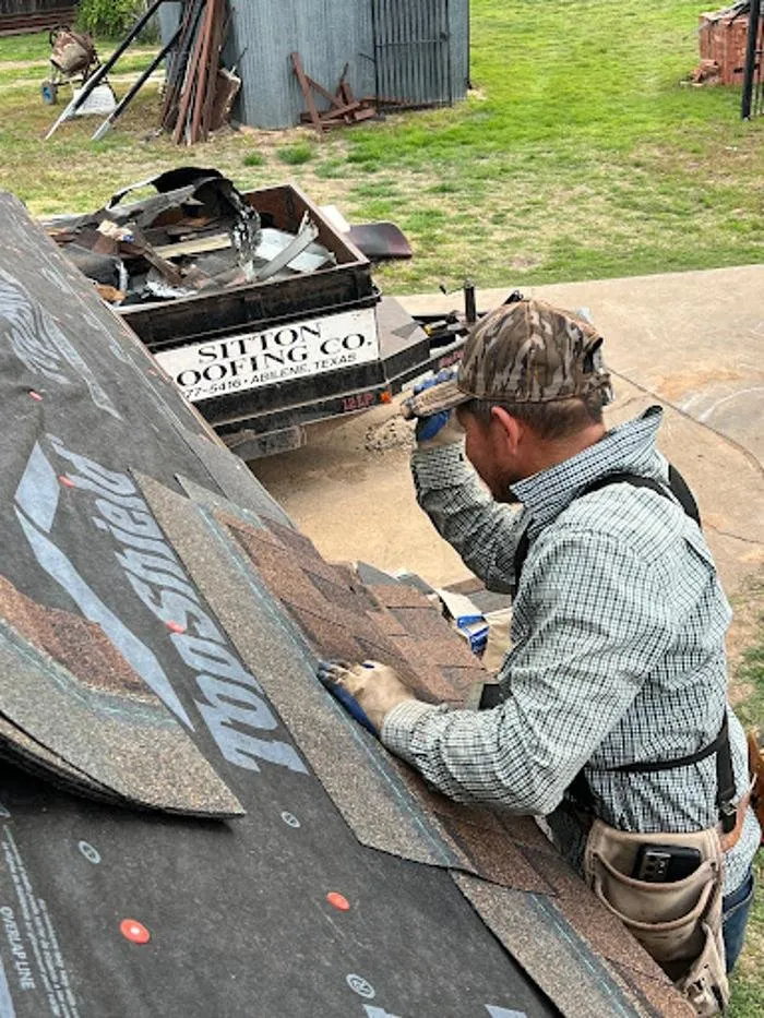 Slide of Sitton Roofing