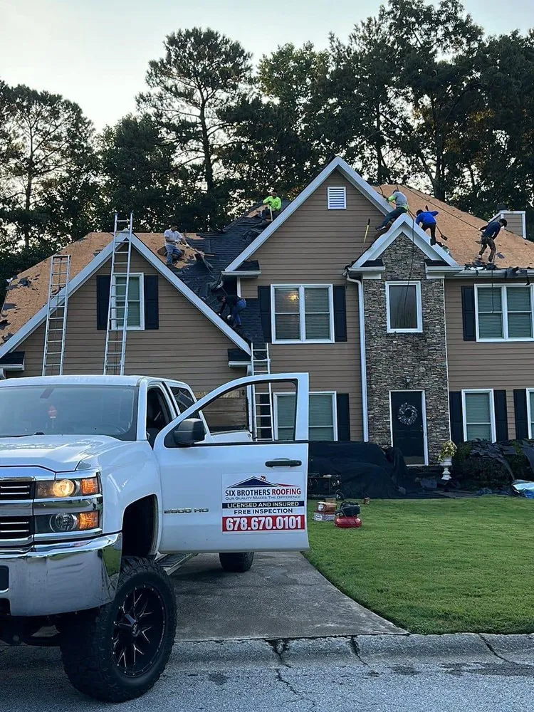 Slide of Six Brothers Roofing