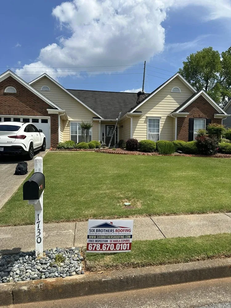 Slide of Six Brothers Roofing