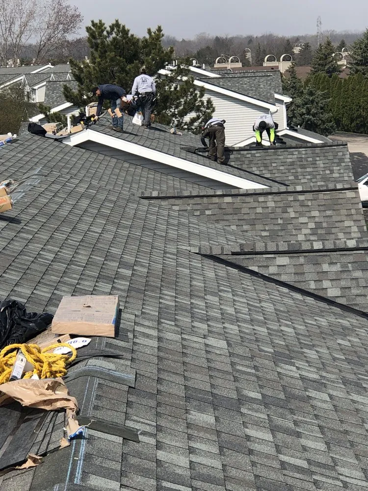 Slide of SJS Roofing & Construction