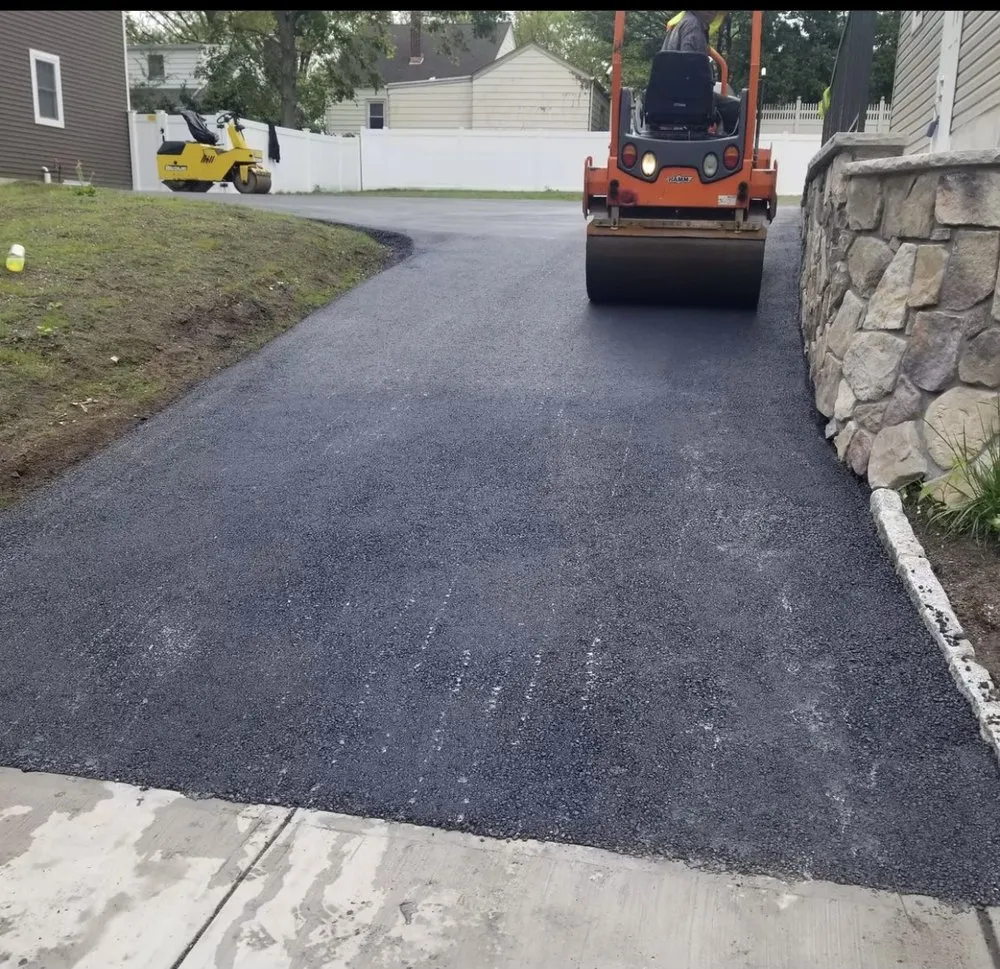 Slide of S&J’s Roofing & Parking Lot Maintenance