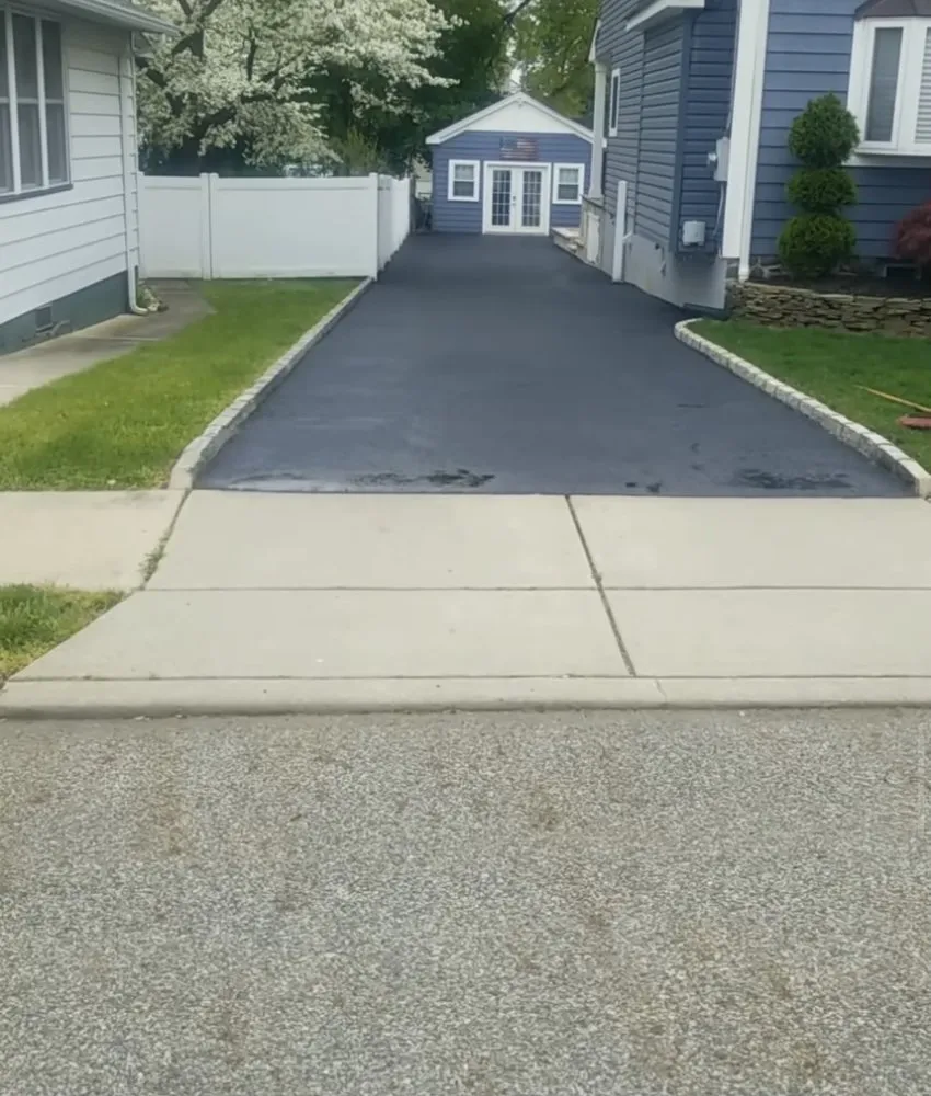 Slide of S&J’s Roofing & Parking Lot Maintenance