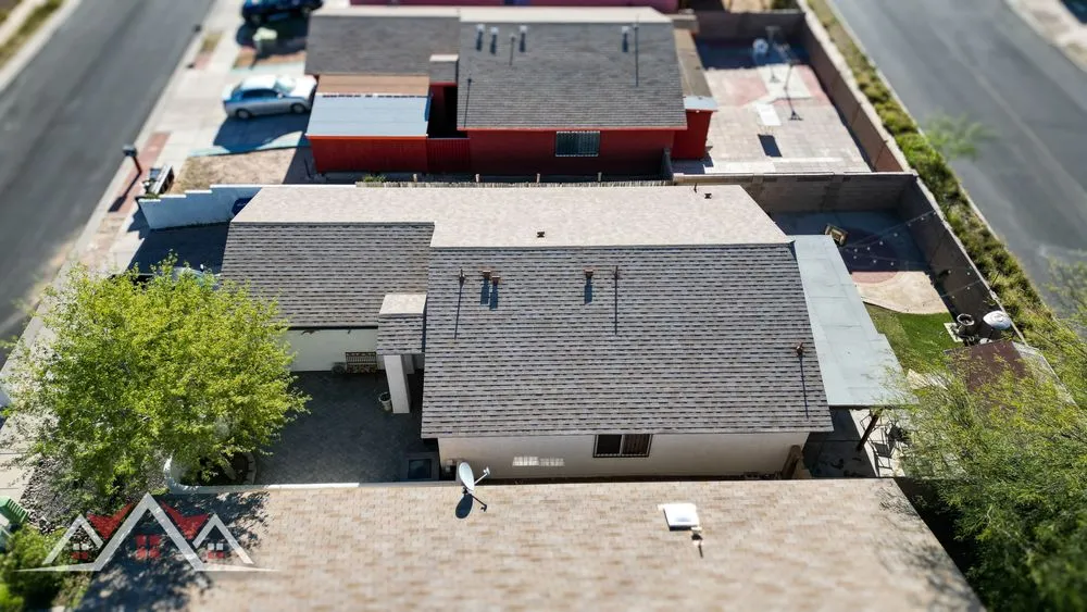 Slide of SKI Roofing