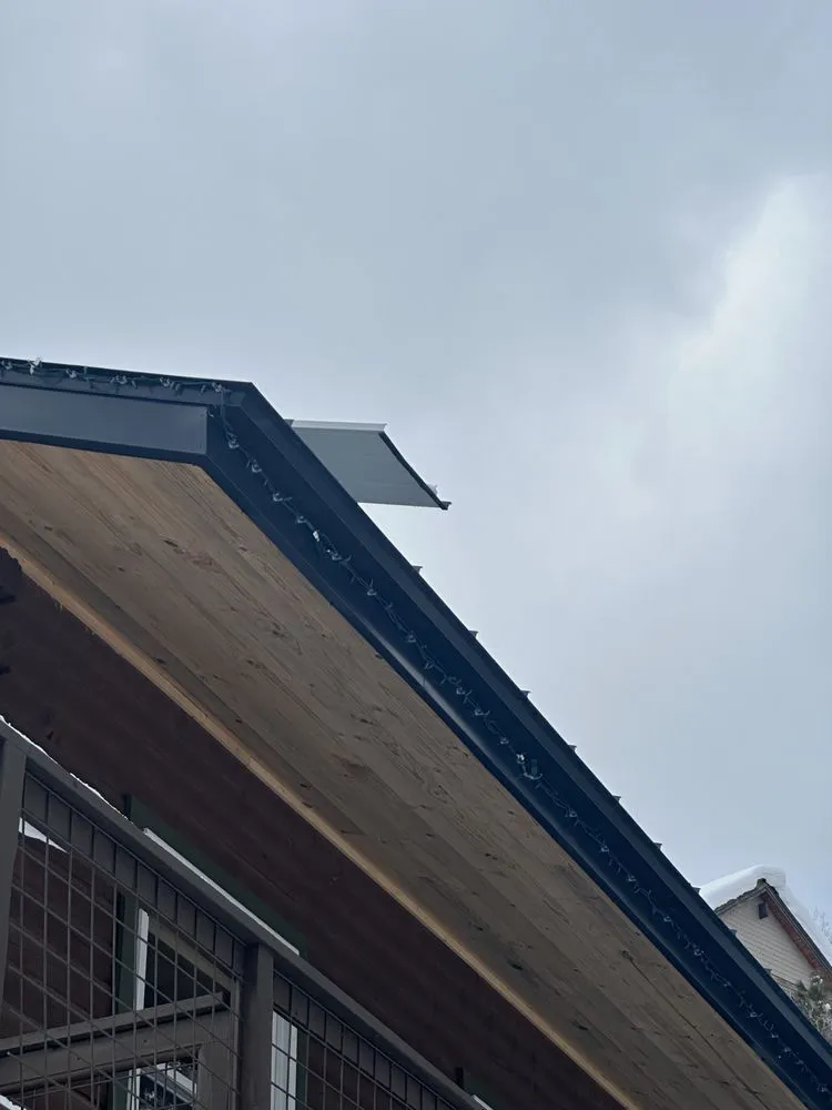 Slide of Ski Town Roofing