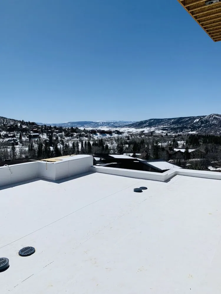 Slide of Ski Town Roofing