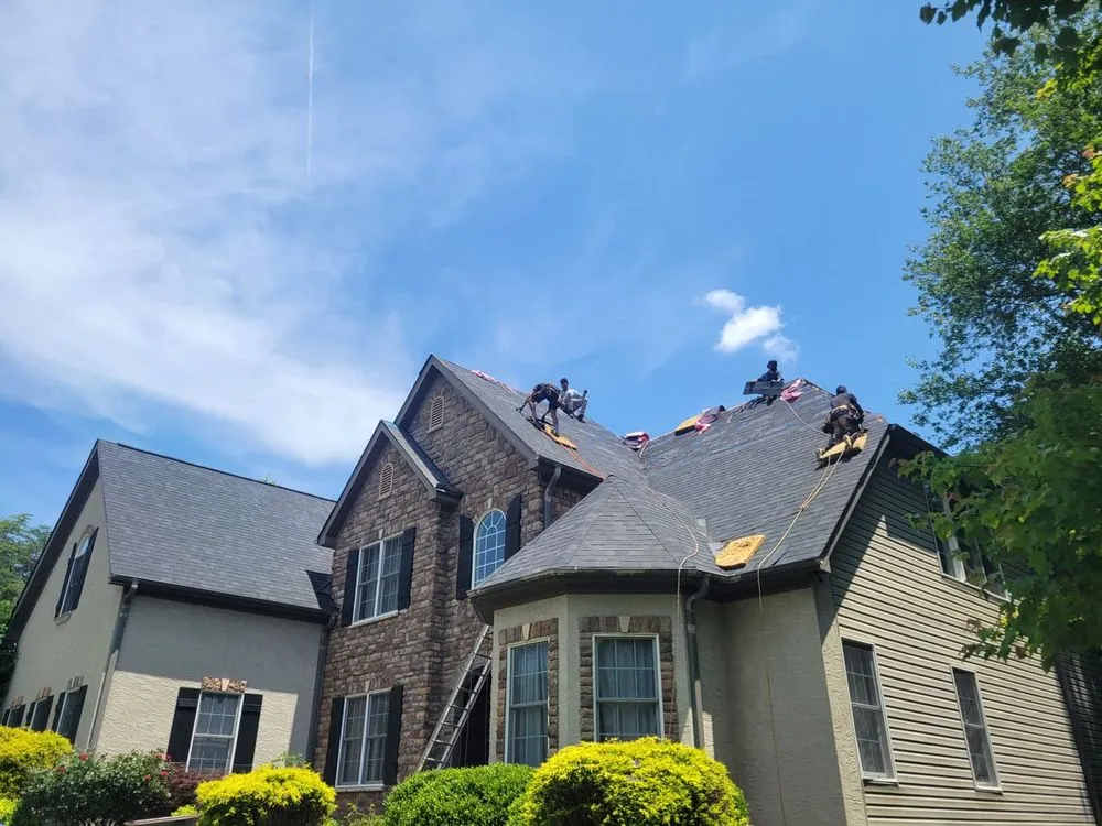 Slide of Sky Blue Roofing