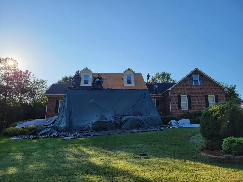 Slide of Sky Blue Roofing
