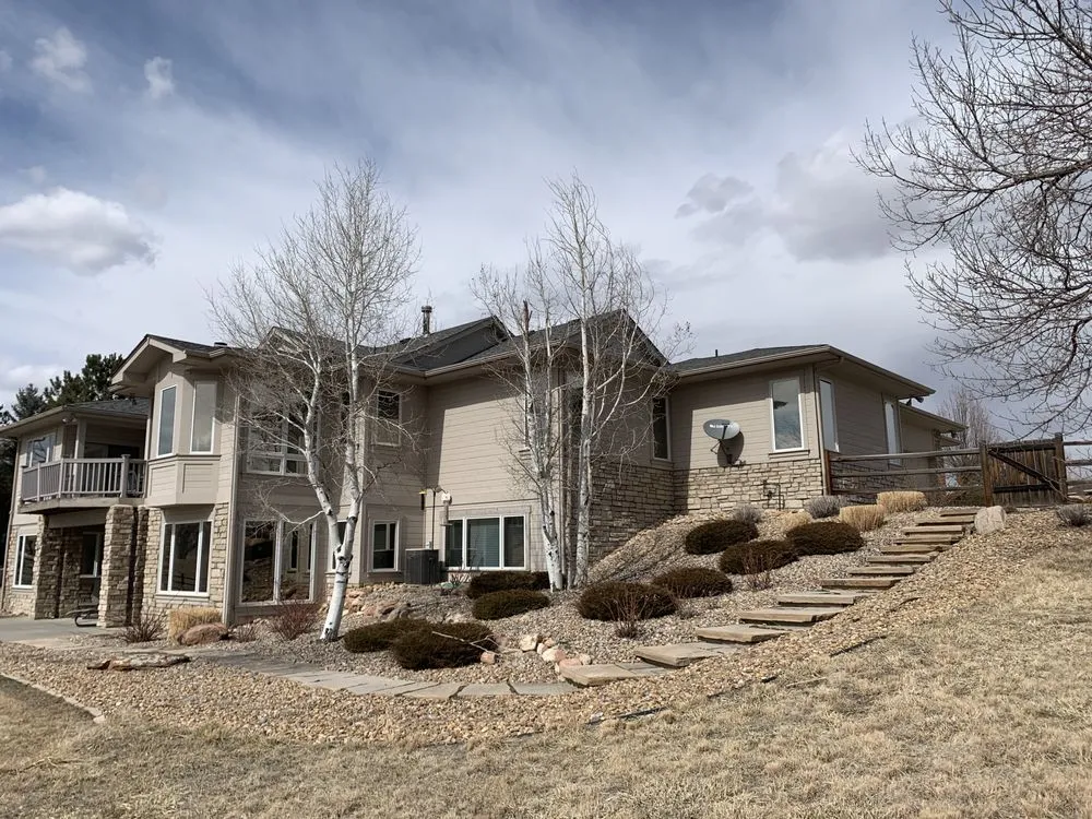 Slide of Sky Manor Roofing