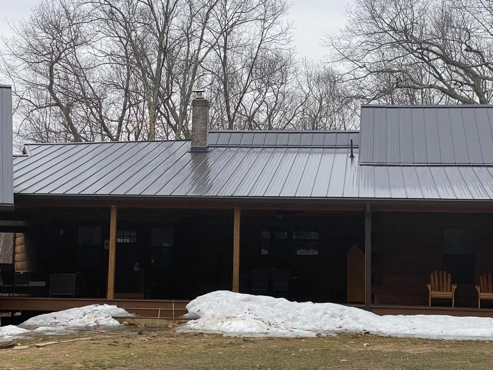 Slide of Sky Metal Roofing