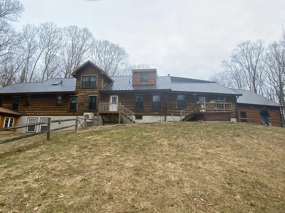 Slide of Sky Metal Roofing