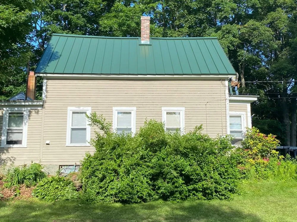 Slide of Sky Metal Roofing