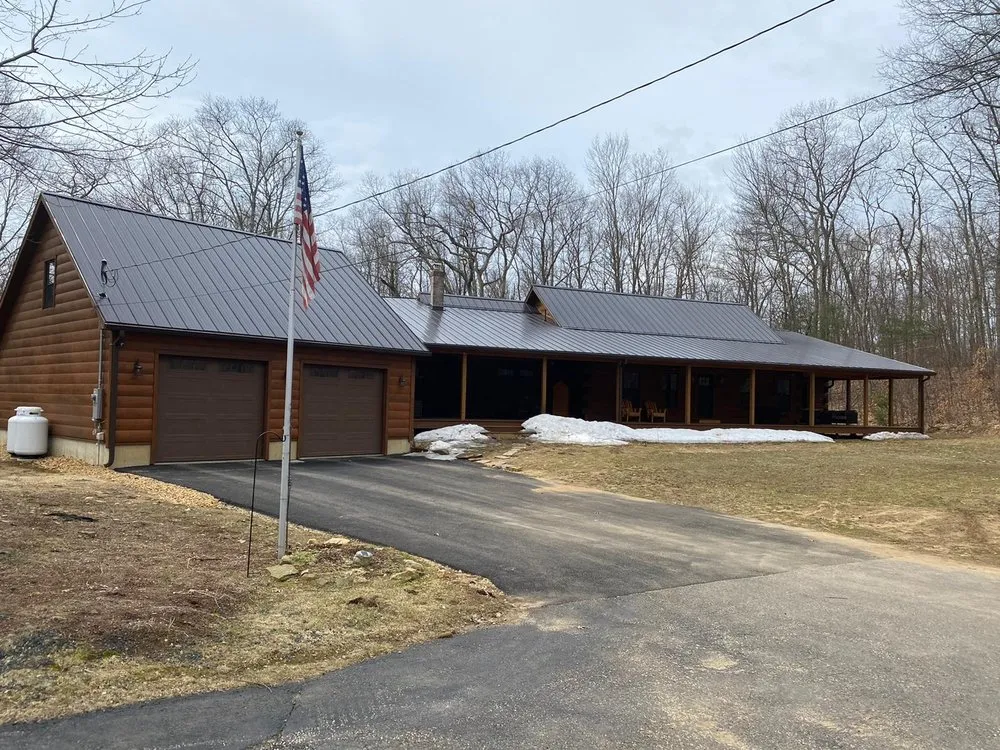 Slide of Sky Metal Roofing