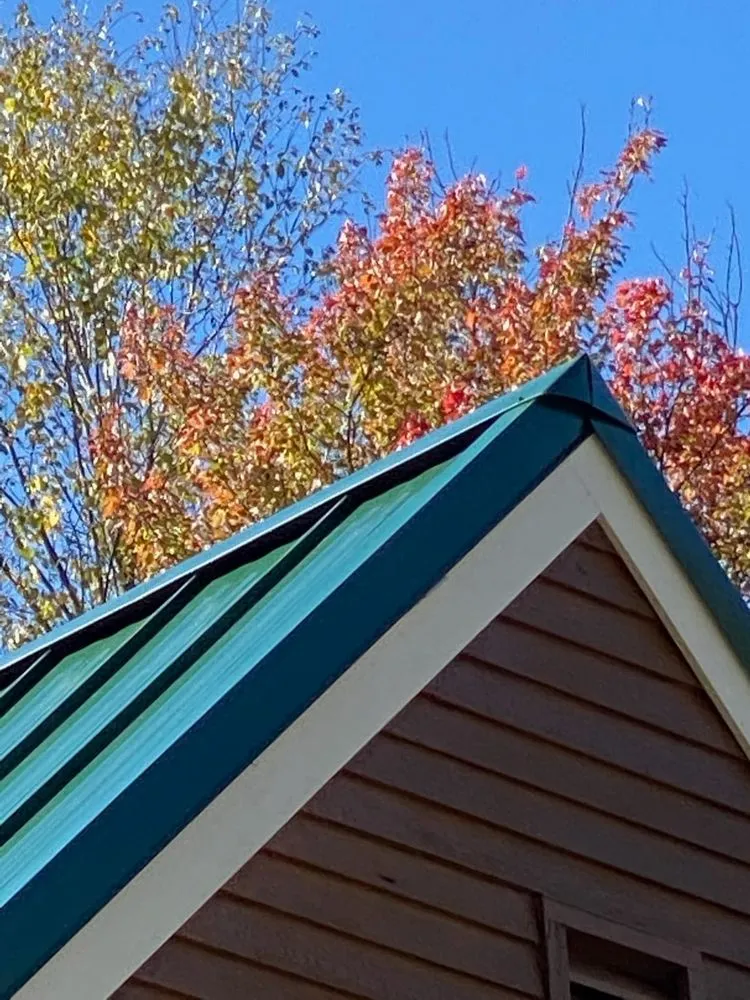 Slide of Sky Metal Roofing