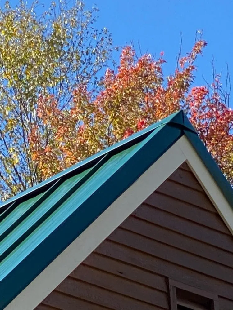 Slide of Sky Metal Roofing