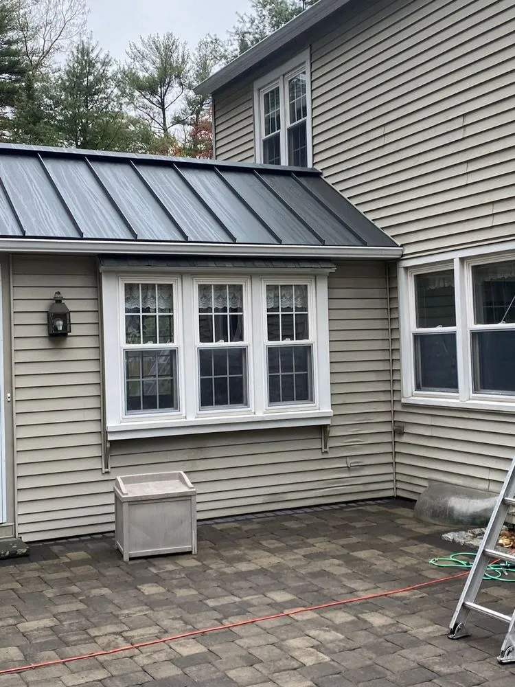 Slide of Sky Metal Roofing