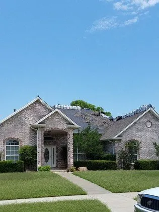 Slide of Sky Roofing