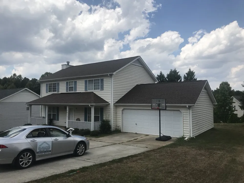 Slide of Sky Solutions Roofing and Construction