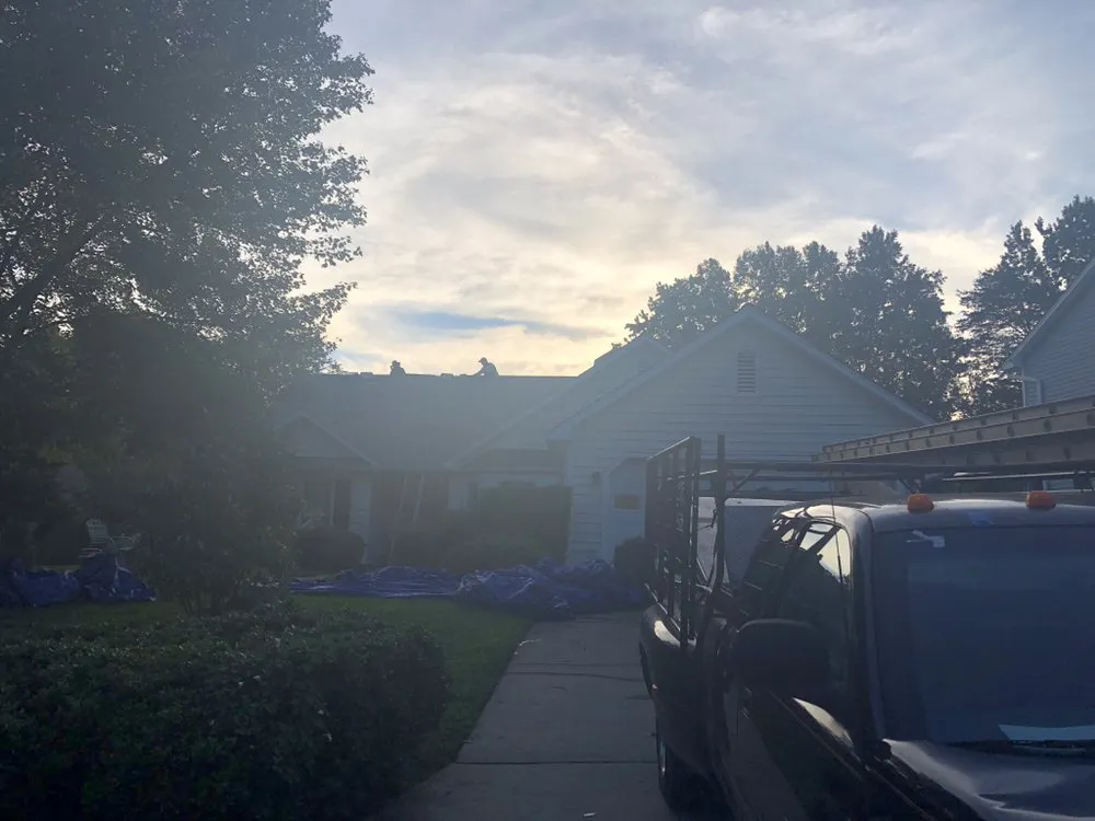 Slide of Sky Solutions Roofing and Construction