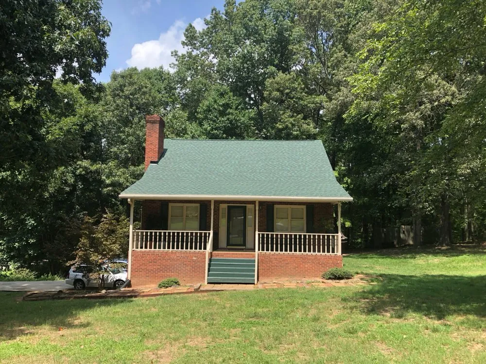 Slide of Sky Solutions Roofing and Construction