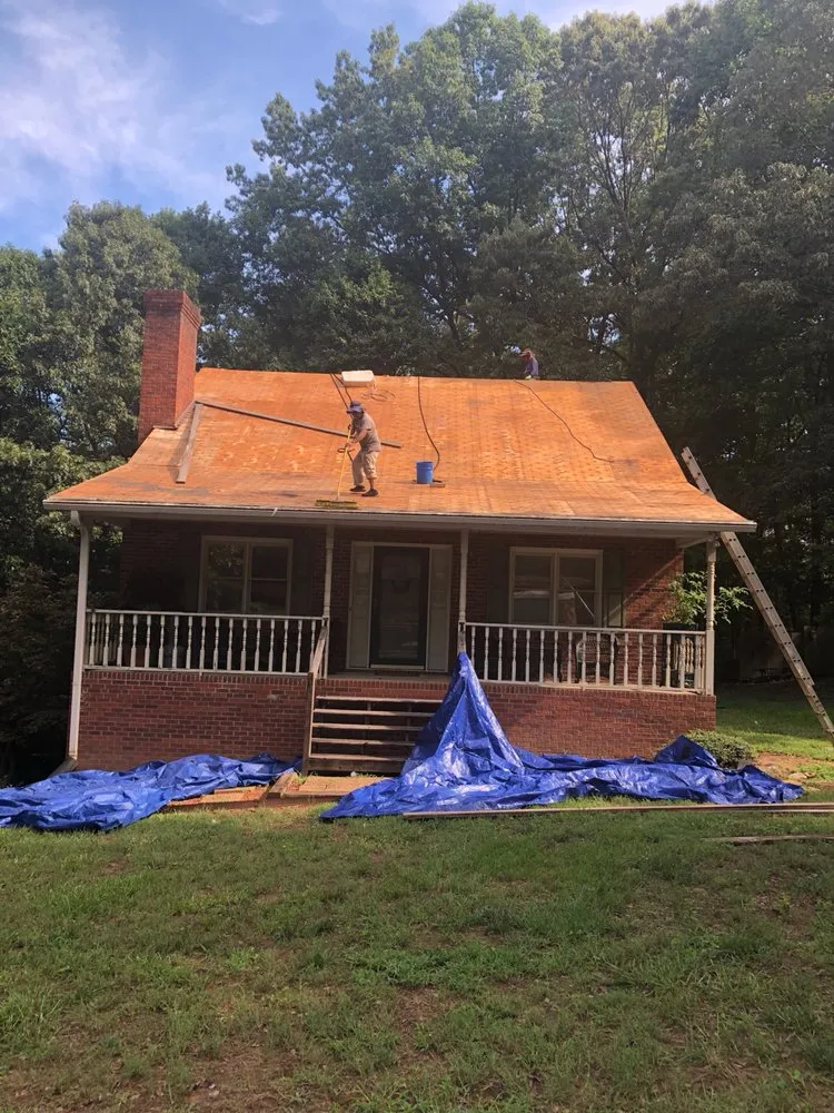 Slide of Sky Solutions Roofing and Construction