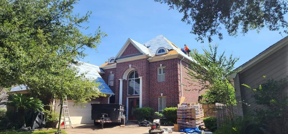 Slide of SkyGuard Roofing Solutions