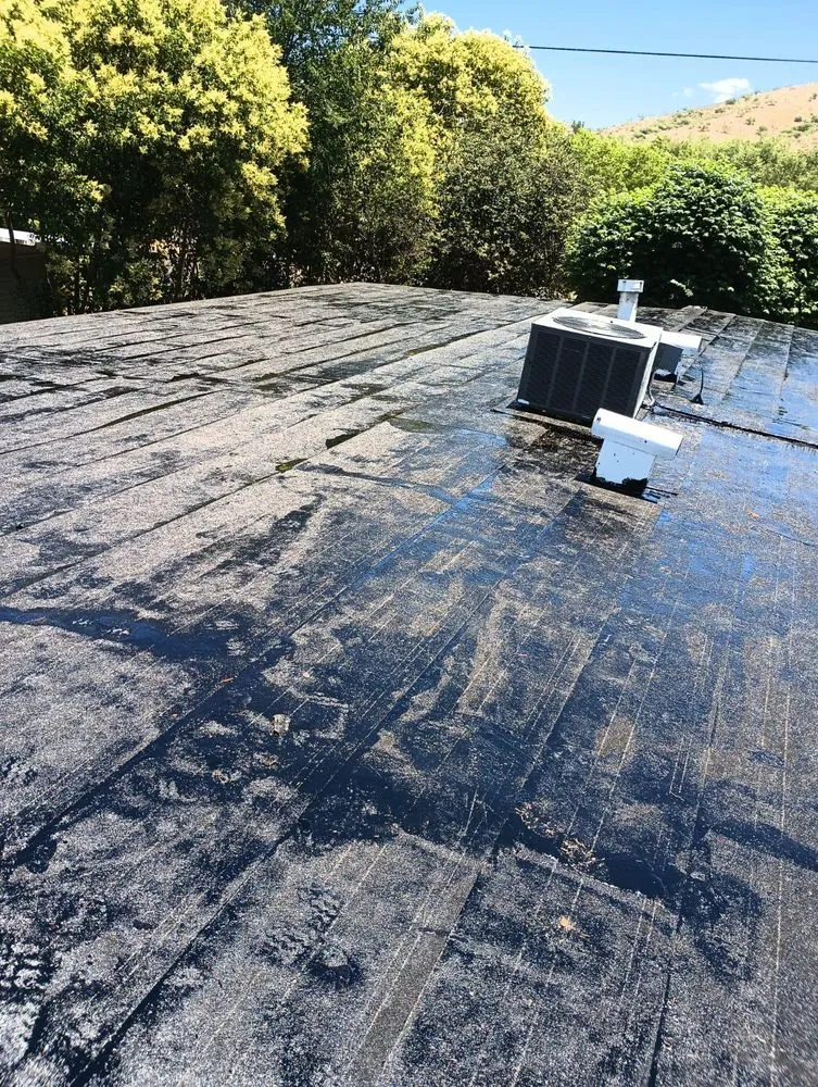 Slide of Skyland Roofing