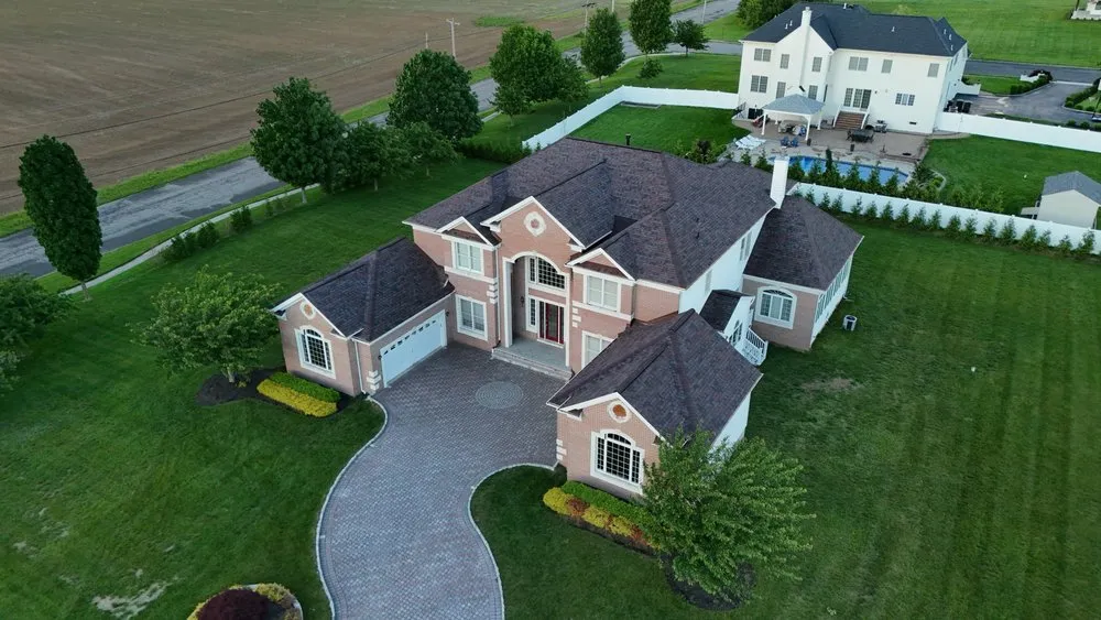 Slide of Skylight Roofing & Restoration