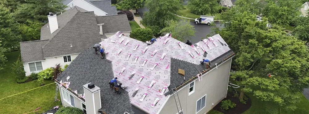 Slide of Skylight Roofing & Restoration