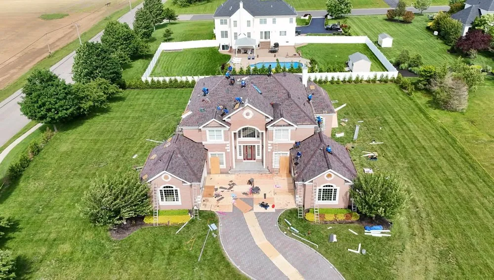 Slide of Skylight Roofing & Restoration