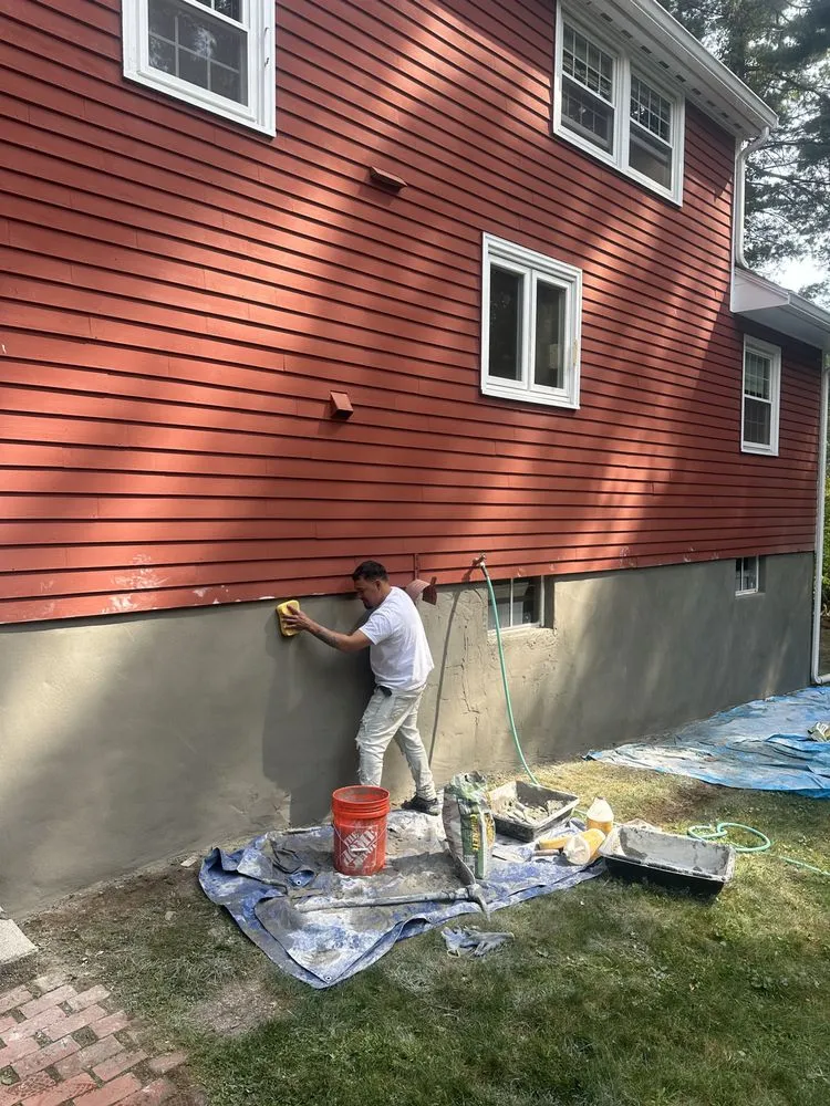 Slide of Skylight Roofing and Masonry