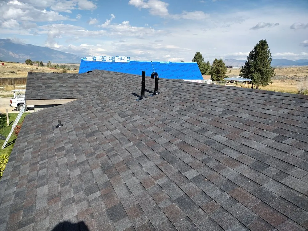 Slide of Sky's The Limit Roofing