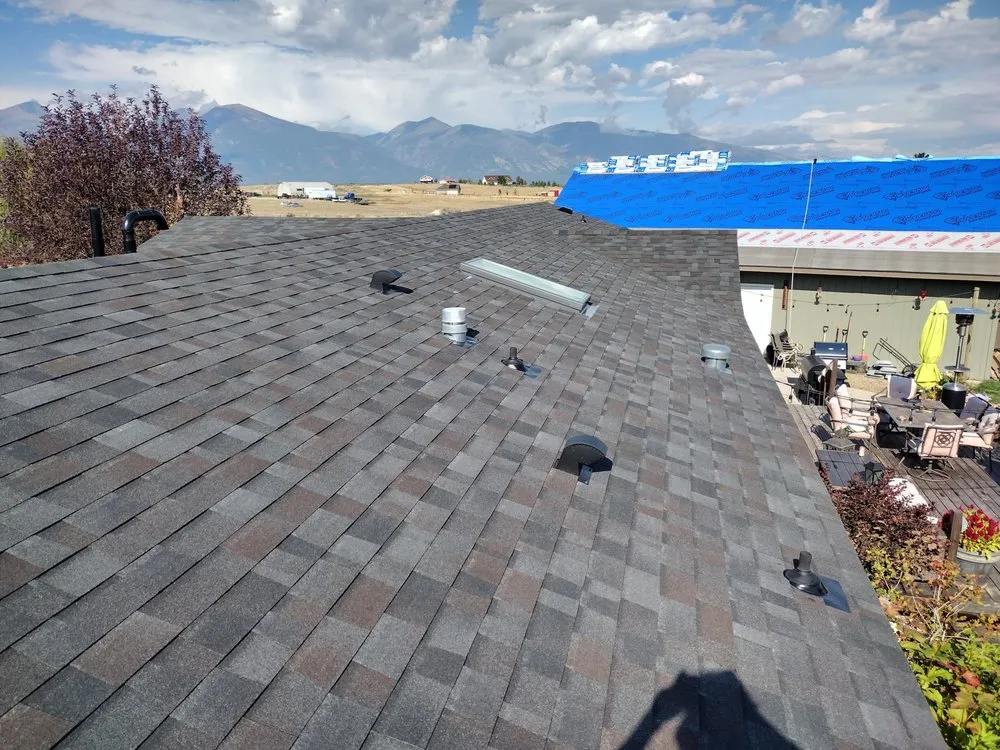 Slide of Sky's The Limit Roofing