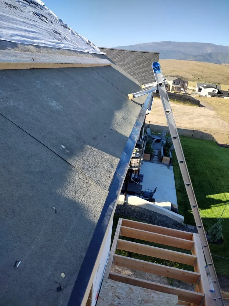 Slide of Sky's The Limit Roofing