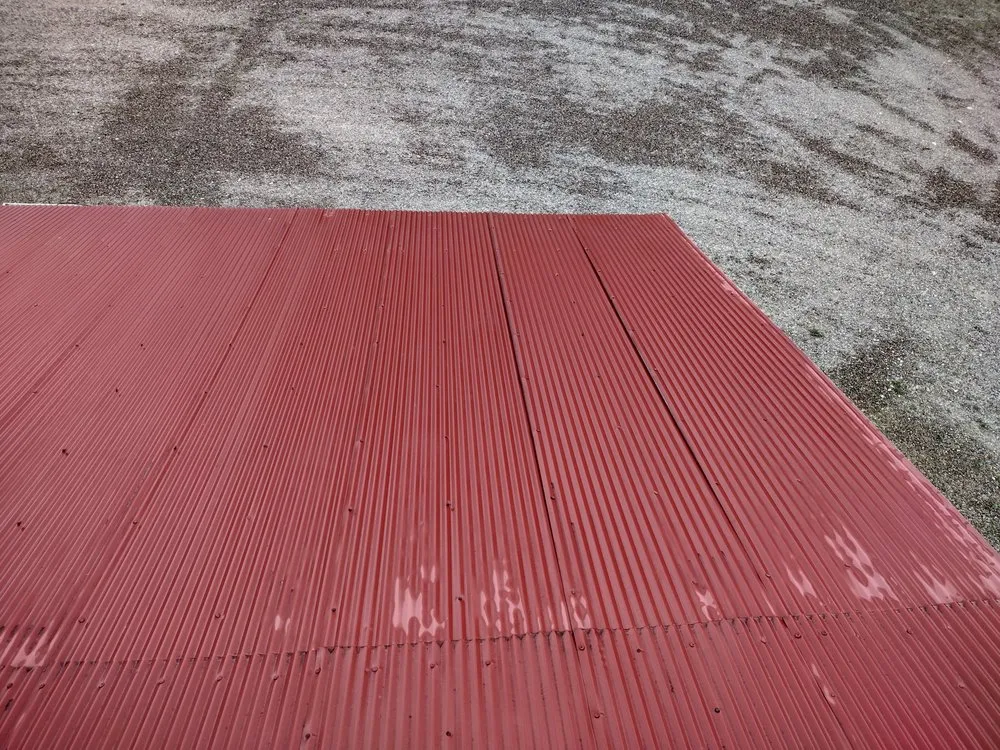 Slide of Sky's The Limit Roofing