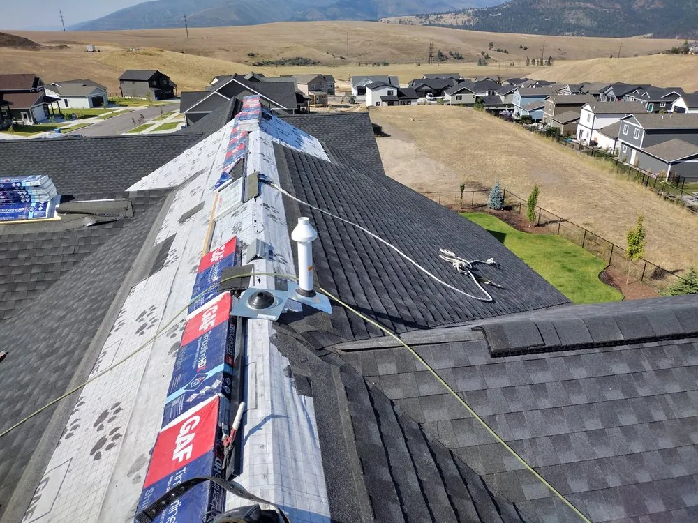 Slide of Sky's The Limit Roofing