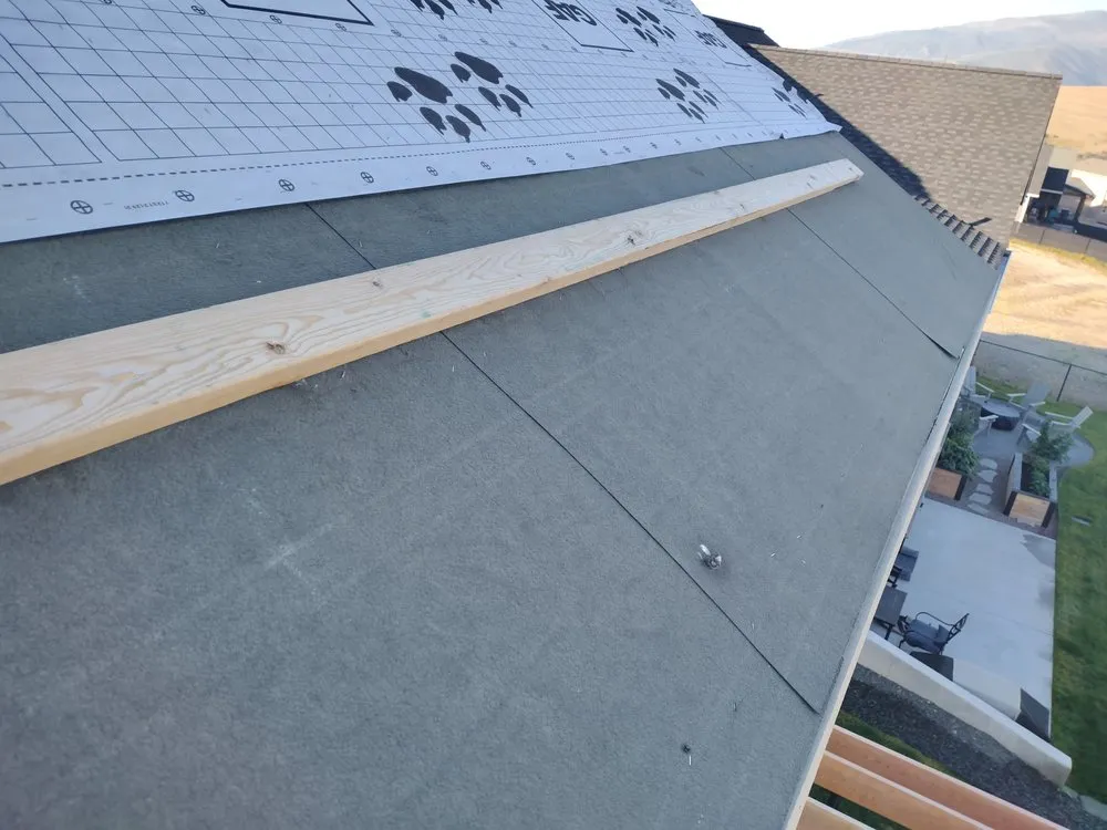 Slide of Sky's The Limit Roofing