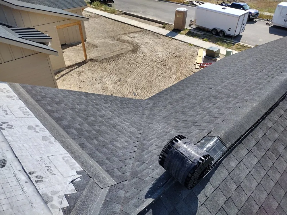 Slide of Sky's The Limit Roofing
