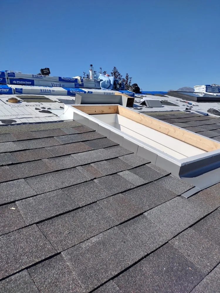 Slide of Sky's The Limit Roofing