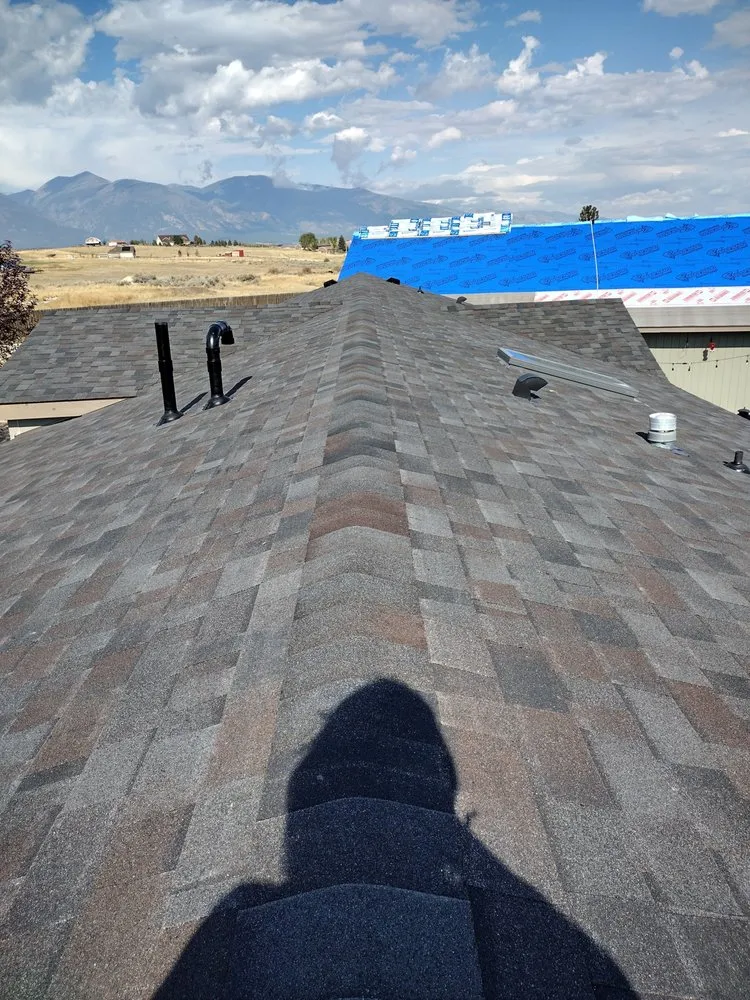 Slide of Sky's The Limit Roofing