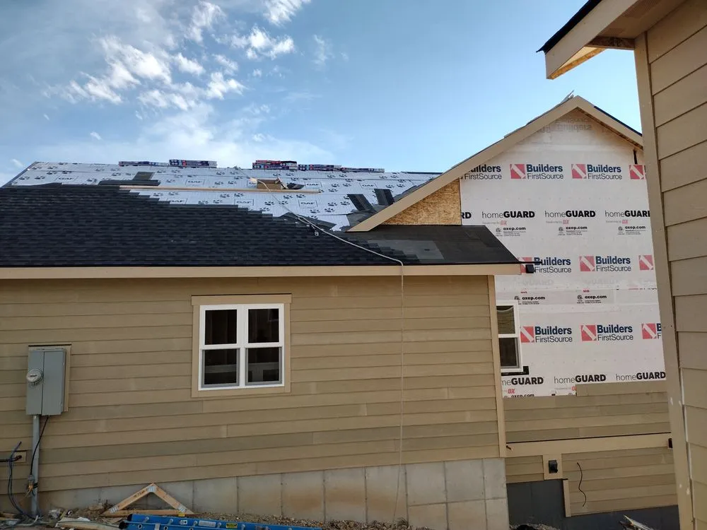 Slide of Sky's The Limit Roofing