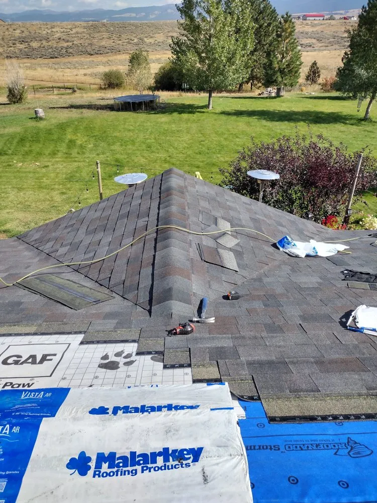 Slide of Sky's The Limit Roofing