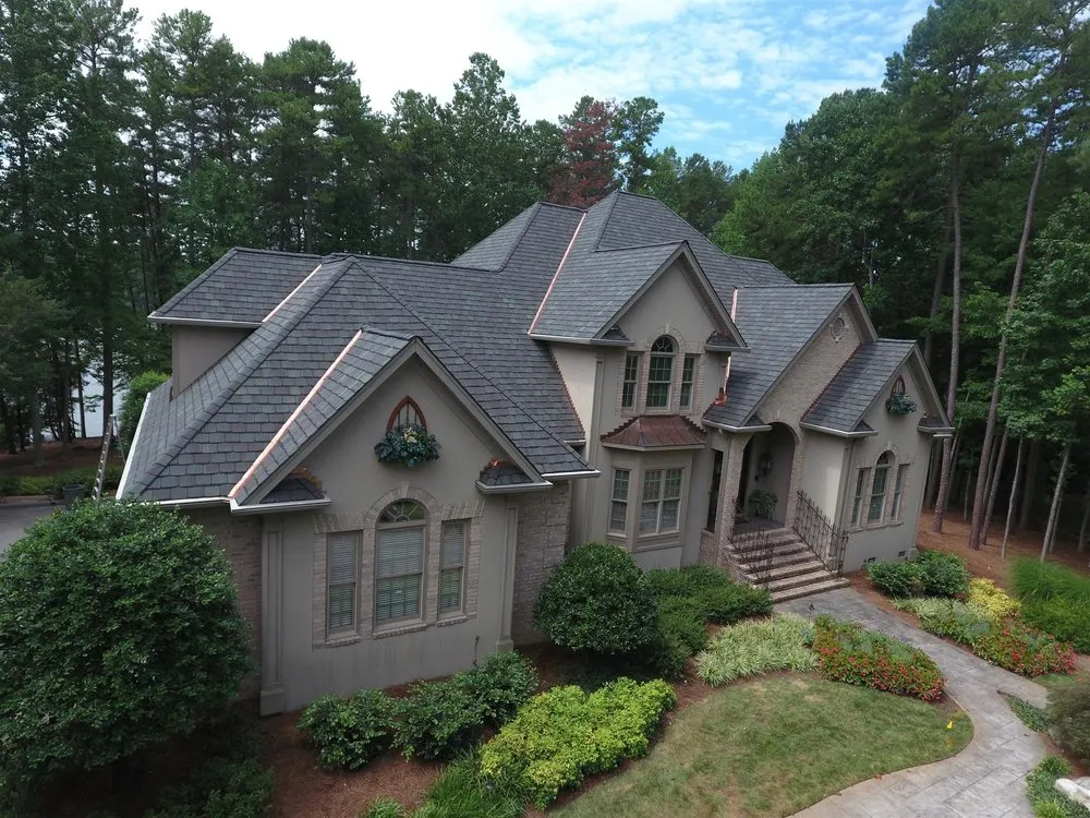 Slide of Skywalker Roofing Company