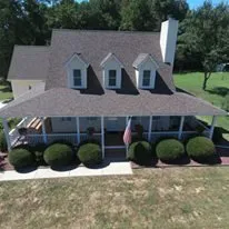 Slide of Skywalker Roofing Company