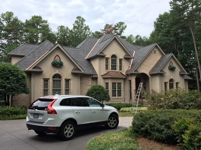 Slide of Skywalker Roofing Company