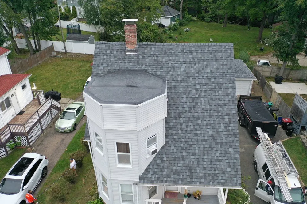 Expert roof installation after storm damage in Middleboro, MA by Skyway Exteriors