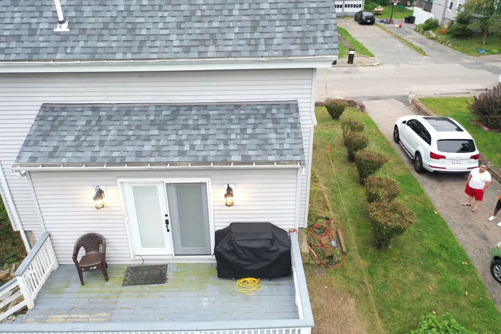 Emergency storm damage roof repair for homes in Middleboro, MA by Skyway Exteriors